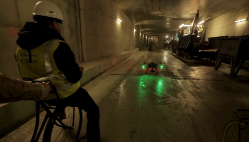 tunnel drone pilot amsterdam on bicycle